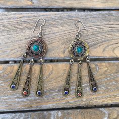 Turquoise and lapis lazuli and corals set on brass earrings Sterling silver ear wire Approximately 4 inches long Vintage Turquoise, Brass Earrings, Ear Wire, Lapis Lazuli, Sterling Silver Earrings, Coral, Dangle Earrings, Brass, Turquoise