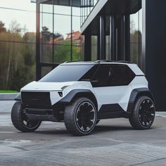 an electric vehicle parked in front of a building