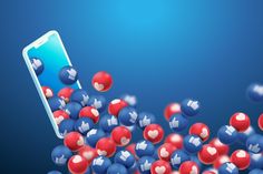 a cell phone surrounded by red, white and blue balls in the shape of hearts