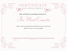 a pink certificate with an ornate frame and ribbon on it's border is shown