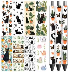 four pencils with cats and plants on them, one is black the other is white