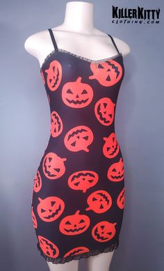 Get spooky in this cute pumpkin print dress. Black ruffle detailing on the neckline and hem and adjustable bra straps for the perfect fit. LENGTH: 24" - 26" armpit to hem. MATERIAL: Spandex Kitty Clothes, Adjustable Bra, Pumpkin Print, Cute Pumpkin, Bra Straps, Black Ruffle, British Indian, Blouse Dress, Dress Black