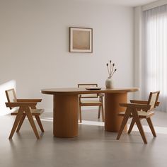 a wooden table and chairs in a white room with curtains on the window sill