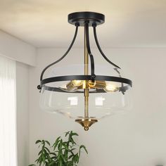 The 3-Light black and gold semi-flush ceiling light by Uolfin Lighting features matte black, brass gold, and clear glass shades to bring a uniquely modern and retro style. Simplistic and chic, the transitional black semi-flush mount Light has modern hardware and a clear glass shade that exudes a sleek and minimal aesthetic. The bowl-shaped shade creates a tailored profile and allows the light to shine through the clear glass that will perfectly accent your transitional living room or kitchen. The farmhouse ceiling light complements any decoration and will be a beautiful view from the ceiling of your home. The bedroom flush mount light is ideal for an entryway, hallway, foyer, dining room, kitchen, living room, bedroom, etc. Uolfin 3-Light Matte Black LED Semi mount light | AVVJFA-LWS24927- Black Foyer Lighting, Black Flush Mount Ceiling Lights, Uolfin Lighting, Black And Brass Chandelier, Foyer Ceiling Lights, Flush Mount Kitchen Lighting, Lights Over Kitchen Island, European Lighting, Small Foyer