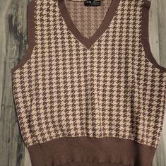 Womens Brown And Tan Sweater Vest. Never Worn. Casual Brown Vest For Fall, Trendy Brown Sweater Vest For Fall, Retro Brown Sweater Vest For Winter, Chic Brown Fitted Sweater Vest, Chic Fitted Brown Sweater Vest, Fitted Chic Brown Sweater Vest, Trendy Brown Vest For Fall, Casual Fitted Brown Vest, Classic Brown Sweater Vest For Fall