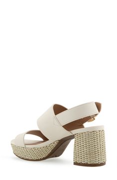 Padding at the heel keeps you comfy in this chic slingback sandal raised by a wrapped platform heel. Synthetic upper, lining and sole Imported Chic Platform Slingback Sandals For The Beach, Chic Slingback Sandals With Cushioned Footbed And Block Heel, Synthetic Platform Slingback Open Toe Sandals, White Synthetic Slingback Sandals With Block Heel, White Synthetic Block Heel Slingback Sandals, Chic Synthetic Slingback Sandals With Cushioned Footbed, Synthetic Open Toe Slingback Pumps For Summer, Synthetic Slingback Wedge Sandals For Vacation, Summer Synthetic Slingback Pumps With Open Heel