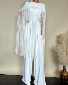 Removable fringe shoulder, white pants suit. White Pants Suit, Short Uggs, Western Boots For Men, Jumpsuit Jacket, Pants Suit, White Pants, Guinea Bissau, Bell Bottoms, Hoodies Men