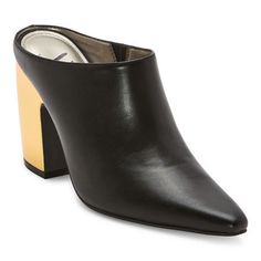 Add a chic and modern touch to any outfit with these Worthington women's Nelda slip-on mules. Made from a durable material with a rubber sole, they feature a sleek black upper with a pointed toe and a 3-inch gold-tone block heel that will standout with every step. Closure Type: Slip-OnShoe Heel Height: 3 InchesUpper/Outer Base Material: 100% PolyuretheneShoe Lining Material: PolyurethaneSole Material Content: 100% Thermoplastic-RubberToe Type: Pointed Toe, Closed ToeCare: Wipe CleanHeel Style: B Trendy Slip-on Heels For Formal Occasions, Modern Black Slip-ons For Fall, Fall Evening Slip-on Mules, Modern Slip-on Heels For Work, Modern Black Mules With Padded Heel, Spring Office Slip-on Mules, Trendy Mules With Sculpted Heel For Work, Trendy Stacked Heel Mules For Work, Trendy Mules With Stacked Heel For Work