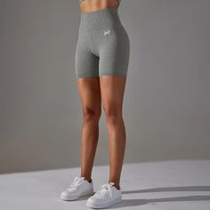 Engineered with seamless technology, these shorts offer a second-skin fit that moves with you, ensuring maximum flexibility and freedom of movement during every workout. The innovative scrunch detail accentuates your curves while providing a flattering and supportive fit. Crafted with moisture-wicking fabric, these shorts keep you dry and comfortable, no matter how intense your training session gets.✔️High waisted ✔️Compressive waistband✔️Thigh and glute contour shading✔️Subtle glute scrunch✔️Se Seamless Athletic Shorts With Built-in Liner For Training, Stretch Moisture-wicking Seamless Shorts, Compressive Athletic Shorts For Gym In Gray, Compressive Gray Athletic Shorts For Gym, Gray Compressive Athletic Shorts For Gym, Moisture-wicking Seamless Shorts For Yoga, Stretch Gym Athletic Shorts With Seamless Construction, Stretch Athletic Shorts For Gym With Seamless Construction, Micro-elastic Seamless Athletic Shorts For Gym