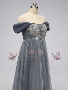 This elegant Gray Regency Bridgerton Empire Waist Lace Formal Dress is a must-have staple for your formal wardrobe. Crafted from a luxurious lace and tulle fabric, this dress has a classic 1920s Empire style silhouette that is perfect for your next Bridgerton ball, regency-themed event or grand wedding. With timeless style and endless elegance, you'll look like a true Bridgerton! Silhouette: Empire Style: Elegant Primary Fabric: Lace and Tulle Neckline: Off the Shoulder Closure: Corset Back Made Violet Bridgerton Dress, Lace Evening Dress With Lace Trim For Banquet, Elegant Tulle Dress With Lace Patchwork, Gala Evening Dress With Lace Bodice And Tulle, Gala Evening Dress With Lace Bodice, Elegant Tulle Lace Dress With Lace Trim, Elegant Tulle Lace Dress, Regency Inspired Dress, Banquet Evening Dress With Lace Trim