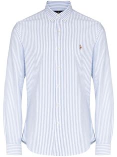 Blue/white cotton Polo Pony striped Oxford shirt from POLO RALPH LAUREN featuring pinstripe pattern, signature Polo Pony motif, button-down collar, front button fastening, buttoned-cuff sleeves and rear curved hem. Future Son, Oxford Shirt Men, Pinstripe Pattern, Western Denim Shirt, Polo Pony, Wool Shirt, Ralph Lauren Outfits, Cotton Polo, Ralph Lauren Polo