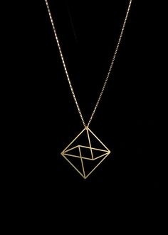 The Octahedron pendant is part of The Edges Collection. Inspired by a simple line drawing, the two-dimensional octahedron shape creates the illusion of geometry in three dimensions. The visual ambiguity results in wearable art that is light and minimal, understated yet unique. Available as either 14K gold-plated with a gold-filled chain or stainless steel with a sterling silver chain. All chains are 18". The Edges collection is created through a process of photochemical etching. Minimalist Geometric 14k Gold Jewelry, Minimalist Geometric Jewelry In 14k Gold, Minimalist 14k Gold Geometric Jewelry, Minimalist Pyramid-shaped Jewelry For Gifts, Geometric 14k Gold Jewelry, Simple Line Drawing, Simple Line Drawings, Geometric Pendant, Jewelry Pendant