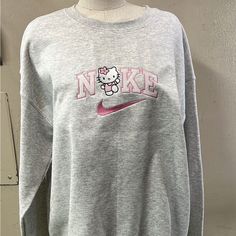 Nike Hello Kitty Crew Neck Sz L Embroidered Nike Hello Kitty Sweater, Hello Kitty Nike Sweatshirt, Hello Kitty Fit, Hello Kitty Nike, Hello Kitty Sweater, Sweaters Nike, Outfits To Buy, Nike Hoodies For Women, Sanrio Clothes