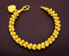 Yellow Gold Plated Bracelets For Wedding, Yellow Gold-plated Bracelets For Wedding, Elegant Yellow Flower Bracelets, Elegant Yellow Flower Bracelet, Yellow Gold Flower Bracelets For Wedding, Gold Floral Jewelry For Festivals, Yellow Jubilee Bracelet Jewelry For Wedding, Gold Flower Bracelets For Wedding, Gold Wedding Jewelry