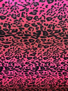 a pink and black animal print fabric