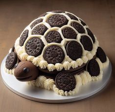 there is a cake made to look like an animal with oreo cookies on it