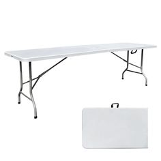 a white rectangular table with black legs and an empty board on the ground next to it