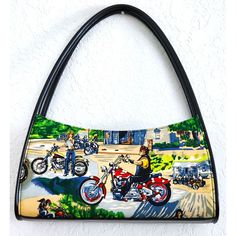 Unique Novelty Purse. This Purse Has The Same Scene On The Front And Back. It Is A Motorcycle Theme. There Is A Woman And A Man With Motorcycles In The Foreground. The Background Has Various Scenes With Motorcycles. One Side Has Rhinestone Accents. You Can See "White Dots" In The Pictures - Those Are The Rhinestones. It Has Faux Black Leather Double Straps. The Inside Is A Small Black & White Check Pattern. There Is A Zipper Center Compartment, A Side Zipper Compartment, And Two Slip Pockets. Th Novelty Purses, Unique Purses, Check Pattern, Tote Handbags, Purses And Handbags, Inside Pocket, Side Zipper, Bags Handbags, A Man