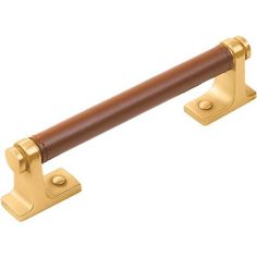 a brass and brown door handle on a white background