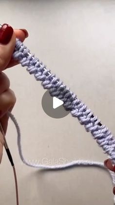 someone is crocheting the end of a piece of yarn