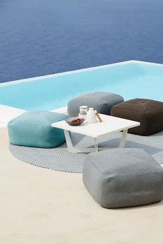 Outdoor Sitting Areas, Pouf Seating, Outdoor Sitting, Sitting Areas, Patio Ottoman, Outdoor Pouf, Outdoor Entertaining Spaces, Unique Fabric, Pouf Ottoman