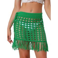 Looking for a stylish and versatile addition to your wardrobe? Look no further than the tassel crochet skirt! This skirt is a perfect choice for any fashion-forward individual who wants to stay on-trend while still feeling comfortable and confident. Whether you're heading to the beach, pool, lake, or resort, this skirt is the perfect choice for a chic and sophisticated look. Pair it with a bikini or a crop top to complete your beach-ready outfit, or wear it as a coverup for a day of lounging in Beachwear Bottoms With Tassels For Beach Party, Beachwear Bottoms With Fringe For Vacation, Fringe Bottoms For Beach Vacation, Beachwear Fringe Bottoms For Vacation, Summer Beach Bottoms With Tassels, Fringe Bottoms For Vacation Beach Season, Beach Party Bottoms With Tassels, Summer Beach Party Bottoms With Tassels, Spring Beach Skirt With Fringe