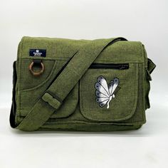 Butterfly Embroidered Laptop Bag It Looks Amazing Any Way You Wear It, Shoulder Or Crossbody! Suitable For Working Professionals And Students. Carry This Sporty, Yet Casual-Looking Laptop Bag Anywhere! Having Organizational Features Such As A Large Spacious Main Compartment And Various Pockets. Underneath The Velcro Flap Opening, You Will Find A Large Zipper-Closed Pocket. Within The Main Compartment, There Is Another Compartment For Your Valuables. In The Front, You Can Find Two Small-Sized Poc Rectangular Everyday Shoulder Bag With Embroidered Logo, Rectangular Shoulder Bag With Embroidered Logo For Everyday, Rectangular Shoulder Bag With Embroidered Logo, Travel Crossbody Shoulder Bag With Embroidered Logo, Travel Crossbody Bag With Embroidered Logo, Casual Embroidered Canvas Shoulder Bag, Everyday Shoulder Bag With Embroidered Logo, Casual Embroidered Travel Bag, Embroidered Canvas Shoulder Bag For Travel