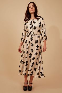 Our Lulu dress is the perfect midi dress to add to your Autumn wardrobe. It has 3/4 length elasticated sleeves and deep bodice tie up opening, which you can leave loose or tie together for a more discreet peep hole opening. Completed in the black and cream white print of our Paper Moon fabric. The perfect versatile dress to dress up with heels, or keep casual with a pair of boots. 100% Tencel  Machine wash 30c. Black Paper Moon, Black And White Paper, Traffic People, Paper Moon, Vintage Inspired Fashion, Moon Print, Lulu Dresses, Midi Dress With Sleeves, Versatile Dresses