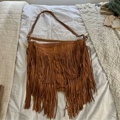 En Shalla Leather Fringe Bag Brown Top Handle Satchel, Brown Top Handle Satchel As Fashion Accessory, Brown Double Handle Shoulder Bag As Fashion Accessory, Leather Satchel Fashion Accessory Bag, Brown Shoulder Bag With Double Handle As Fashion Accessory, Leather Crossbody Bags As Fashion Accessory, Chic Beige Fringe Shoulder Bag, Leather Bags With Adjustable Strap, Camel Leather Satchel Shoulder Bag