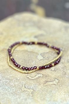 Unleash your inner strength and style with our Garnet Gemstone Bracelet. Featuring rich, deep red garnet gemstones, this bracelet captures the essence of sophistication and vitality. Renowned for its deep, fiery hues and dynamic energy, it's the perfect blend of bold elegance and powerful healing, offering protection, self-confidence, balance, vitality, and passion. The ultimate blend of Bohemian style, elegance, and empowerment, our handcrafted Stretchy Gemstone Wrap Bracelets are made with str Adjustable Spiritual Garnet Jewelry, Adjustable Garnet Gemstone Bracelets, Adjustable Garnet Gemstone Bracelet, Adjustable Burgundy Bracelet, Gemstone Wrap Bracelet, Metal Etching, Garnet Red, Beaded Wrap Bracelets, Wrap Bracelets