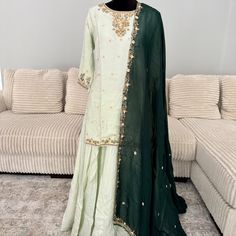 Green Silk Lehenga With Dupatta All Jardoshi Golden Work In Top & Dupatta, Looks So Elegant. Neckline & Sleeves Has Nice Golden & Green Color Work. Perfect Outfit For Evening Or Day Event. Light Green Minty Color With Nice Dark Green Dupatta, Looks Wow With Mahanadi Event As Well. Measurement As Follows: Top Length - 30 Inches Bottom ( Ghaghra ) Length - 38 Iches ( Slight More Than 3 Ft) Sleeves - 3/4th - 17 Inches Burst - 37 Inches With Loose Fit Dark Green Dupatta, Green Silk Lehenga, Lehenga With Dupatta, Green Dupatta, Golden Green, Silk Lehenga, Green Silk, Boutique Dresses, Perfect Outfit