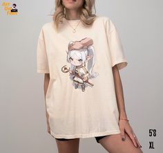 Embrace the cuteness of Frieren with our shirt of her getting a headpat. Crafted from soft, durable material, this shirt offers both comfort and style. Ideal for fans, it's a charming addition to your collection. This is a standard unisex size Comfort Colors Tee. For an oversized look, please size up. *General Information* 🏷️ Unisex tee 🏷️ Preshrunk, soft-washed, garment-dyed fabric 🏷️ Made with sustainably and fairly grown USA cotton Sizing: 📏Relaxed fit (For measurements, refer to the char Kawaii T-shirt For Cosplay With Crew Neck, Kawaii Tops With Cartoon Print For Cosplay, Kawaii Style Fan Merchandise Tops With Crew Neck, Kawaii Crew Neck Tops For Fan Merchandise, Kawaii Fan Merchandise Tops With Crew Neck, Kawaii Short Sleeve Shirt With Character Print, Kawaii Character Print Tops For Fan Merchandise, Kawaii T-shirt With Cartoon Print For Cosplay, Kawaii Character Print Fan Merchandise Tops