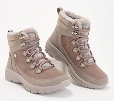 Weather the winter in a boot designed with your utmost comfort in mind. The lace-up style sets a soft pace for the season with a suede design, faux-fur lining and accents, and plenty of cushioning. From Martha Stewart x Skechers. Skechers Snow Boots, Female Winter Shoes, Womens Wide Width Winter Boots, Shoes For Women Snow, Skechers Boots Woman Winter Discontinued, Skechers Women Boots, Womens Winter Boots Snow, Winter Boots Women Snow, Winter Boots Snow