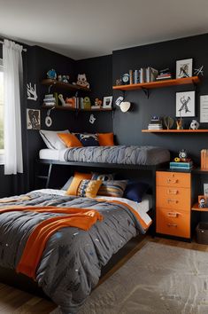 a bedroom with black walls and orange accents