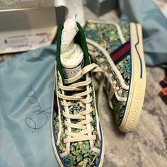 Nib Gucci Floral Love Affair Tennis 77 High-Top Sneakers 627838 1085 100% Authentic Guaranteed Made In Italy Shoes Measurements & Information Condition: Brand New With Box And Dust Bag Eu Size 36,36.5 And 37.5 Fabric Information Color: Green Floral Fabric: Fabric See As A Picture. Brand New With Tag And Box And Two Green Dust Bags. Luxury Green Custom Sneakers For Streetwear, White Gucci Sneakers For Spring, Spring White Gucci Sneakers, Gucci Green Sneakers With Rubber Sole, Designer Green Lace-up Sneakers, Gucci Multicolor Lace-up Sneakers, Gucci High-top Sneakers With Branded Insole, Designer High-top Sneakers For Spring, Gucci Designer Custom Sneakers With Rubber Sole