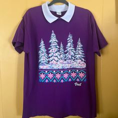 Vintage 1990 Purple Winter Scene Short Sleeve Collared Sweater Large  Snow has glittery look Size L/XL but see measurements below Armpit to armpit 23" Length 30" F  Vintage, retro, colorblock, grannycore, grandmacore, grandpacore, crochet, floral, embroidered, victorian, Edwardian, antique, mid century modern, mcm, old school, nostalgia, nostalgic, folklore aesthetic, cottagecore, delicate, feminine, modest, oversized, muted, cozy School Nostalgia, Folklore Aesthetic, Collared Sweater, Aesthetic Cottagecore, Delicate Feminine, Winter Scene, Collar Sweater, Winter Scenes, Womens Clothing Tops