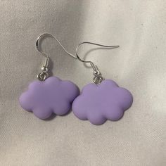 Colorful pastel cloud shaped charm earrings. Adorable and fun accessories! Be sure to check out our other handmade designs from our shop SisandBroCraftyCo <3 Playful Purple Dangle Jewelry, Handmade Trendy Lavender Jewelry, Trendy Handmade Lavender Jewelry, Trendy Lavender Earrings For Gift, Trendy Pastel Earrings For Gift, Trendy Purple Earrings For Everyday Wear, Trendy Pastel Jewelry For Gifts, Casual Handmade Lavender Jewelry, Handmade Pastel Earrings For Gift