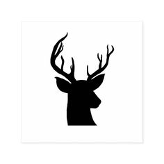 a black and white silhouette of a deer's head with antlers on it