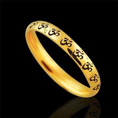 OM AUM Wedding Ring Gold Eternity Om Band Religious Wedding Black Painting Unisex Antique Finish Anniversary The OM (or AUM) sign is the main symbol of Hinduism. Most religions indicate that creation began with sound-- In the beginning was the word... For the Hindus & Buddhists, Om is the primordial sound, the first breath of creation, the vibration that ensures existence. Om sign signifies God, Creation, & the One-ness of all creation. This band is made of 14k yellow gold and is 2.7mm w Symbolic Engraved Wedding Ring, Symbolic Wedding Engraved Ring, Spiritual Engraved Wedding Ring, Symbolic Black Jewelry For Wedding, Symbolic Black Wedding Jewelry, Black Bangle For Wedding, Spiritual Adjustable Engraved Wedding Ring, Adjustable Spiritual Engraved Wedding Ring, Adjustable Spiritual Engraved Ring For Wedding