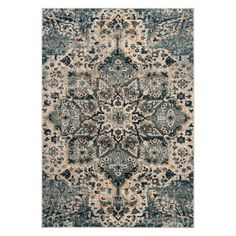 a rug with an ornate design on the front and back side, in blue tones