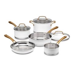 a set of pots and pans with wooden handles