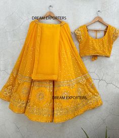 Pretty Yellow Lehenga Choli For Women Haldi Special Lehengas Wedding Party Wear Chaniya Choli Ready To Wear Lhenga Reception Wear Lahengas Details  Lehenga Lehenga Fabric : Georgette Lehenga Work : zari thread foil mirror embroidery Inner : Micro Cotton Size : Semi Stitched Up to 44 Length : 42 Choli Choli Fabric : Georgette Choli Work : zari thread sequence embroidery Size : 2.30 Mtr Dupatta Dupatta Fabric : Soft Net Dupatta Work : thread , lace border  Semi stitched lehenga means that the pattern of the lehenga is ready and only the fitting of the lehenga as per your waist and height(waist to floor) has to be done. The lehenga is ready to be stitch to your desired size. The blouse(Top/Choli) of lehenga is un-stitched patterned fabric. For Made to Measure Orders Kindly message me. I will Fitted Gown With Gota Work For Diwali, Wedding Floor-length Sharara With Unstitched Blouse, Unstitched Blouse Wedding Sets For Diwali, Wedding Choli With Pallu In Georgette, Fitted Georgette Traditional Wear For Wedding, Semi-stitched Lehenga For Wedding And Festivals, Wedding Georgette Choli With Pallu, Art Silk Lehenga For Wedding And Festivals, Floor-length Sharara For Wedding And Diwali