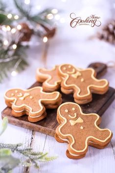 some cookies are sitting on a wooden tray