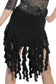 a woman wearing a black skirt with ruffles on the bottom and an attached belt