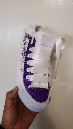 Adult Tennis Shoes with Pearl's and  Rhinestones ( Bling ) Color combinations vary: Pictured tennis shoes have a combination of: Pearls:   Purple, Lavender  Rhinestones:   Crystal, Purple, Lavender, Crystal AB *Made to Order ( No Refunds on personalized items ) 6 US  =  ( 4 UK / EUR 37 / CM 22.5 ) 7 US =  ( 5 UK / EUR 38 / CM 23.5 ) 8 US = ( 6 UK / EUR 39 / CM 24.5 ) 9 US = ( 7 UK / EUR 40 / CM 25.5 ) 10 US = ( 8 UK / EUR 41 / CM 26.5 ) 11 US = ( 9 UK / EUR 42 / CM 27.5 ) 12 US = ( 10 UK / EUR 43 / CM 28.5 ) Purple Tennis Shoes, Anniversary Gift Ideas For Him Boyfriend, Bling Wedding Shoes, Bedazzled Shoes Diy, Bedazzled Shoes, Custom Sneakers Diy, Tie Sneakers, Crystal Purple, Diy Sneakers