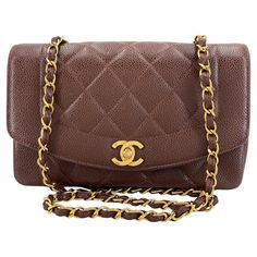 Store item: 68507 We adore this Chanel 1994 Vintage Brown Caviar Small Diana Flap Bag 24k GHW - The combination of the pebbled calfskin with the 24k gold plated hardware is a holy grail for many Chanel enthusiasts. The fact that it's a chestnut brown color makes it even more rare. This item is pre-owned and vintage, and a fabulous collectible piece. This style with single chain strap and curved front panel, also known as the "Diana bag," was recently resurrected by Chanel due to its popularity, Chanel 1994, Chestnut Brown Color, Hermes Kelly Bag, Not Again, Bracelet Love, Shoulder Chain, Chestnut Brown, Holy Grail, Gold Jewelry Fashion