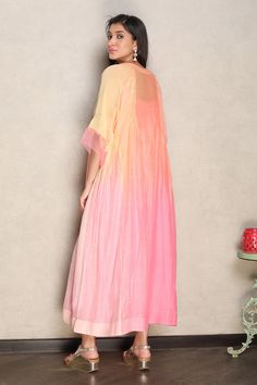 Pink and coral 4D shaded silk chanderi kurta with sequins and thread hand embroidery. Comes with a cotton mulmul slip.
Components: 2
Pattern: Hand embroidered
Type Of Work: Sequins, Thread
Neckline: Kurta : Notched, Slip : Round
Sleeve Type: Kurta : Three quarter, Slip : Sleeveless
Fabric: Kurta : Silk chanderi, Slip : Cotton mulmul
Color: Pink, Coral
Other Details: 
Closure : Front tie-up with tassels
Occasion: Mehendi and Haldi,Sangeet - Aza Fashions Summer Straight Kurta With Sheer Dupatta, Straight Kurta With Sheer Dupatta For Summer, Summer Silk Semi-stitched Kurta, Multicolor Designer Anarkali Set For Summer, Silk Anarkali Set For Summer Designer Wear, Designer Cotton Silk Kurta For Summer, Summer Multicolor Kurta With Zari Work, Summer Designer Cotton Silk Kurta, Summer Designer Wear Cotton Silk Kurta