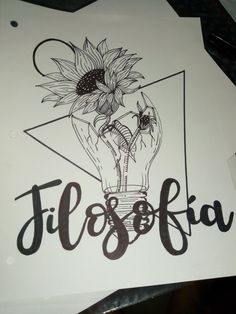 a drawing of a light bulb with sunflowers in it and the words filsoff above it