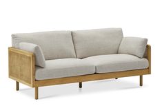 an image of a couch that is made out of wood and upholstered with fabric