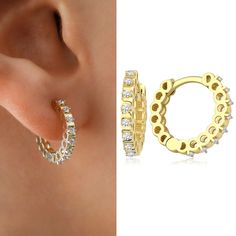 Introducing the 14k Gold Surface Prong Setting Hoop Earrings, the ultimate accessory for any fashion-savvy woman. These stunning earrings are crafted from high-quality 14k gold and feature a beautiful full eternity of sparkling CZ gemstones, making them the perfect addition to any outfit. Whether you're dressing up for a special occasion or simply looking to add a touch of elegance to your everyday wardrobe, these earrings are sure to make you feel confident and stylish. The huggie design of these earrings makes them easy to wear and perfect for everyday wear, while the prong setting ensures that the gemstones are securely in place. These earrings are also a great gift for any woman in your life, whether it's for a birthday, anniversary, or simply as a special surprise. Treat yourself or s Cubic Zirconia Hoop Earrings With Prong Setting As Gift, Cubic Zirconia Huggie Earrings With Sparkling Stones For Anniversary, Dazzling Yellow Gold Hoop Earrings With Prong Setting, Anniversary Huggie Earrings With Sparkling Stones, Anniversary Gift Cubic Zirconia Huggie Earrings With Sparkling Stones, Anniversary Huggie Earrings With Sparkling Cubic Zirconia, Anniversary Cubic Zirconia Huggie Earrings With Sparkling Stones, Fine Jewelry Pierced Huggie Earrings For Anniversary, Fine Jewelry Round Huggie Earrings With Sparkling Stones